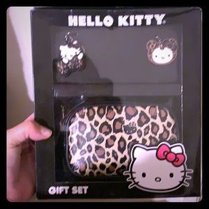 Loungefly cosmetic bag and keychains.